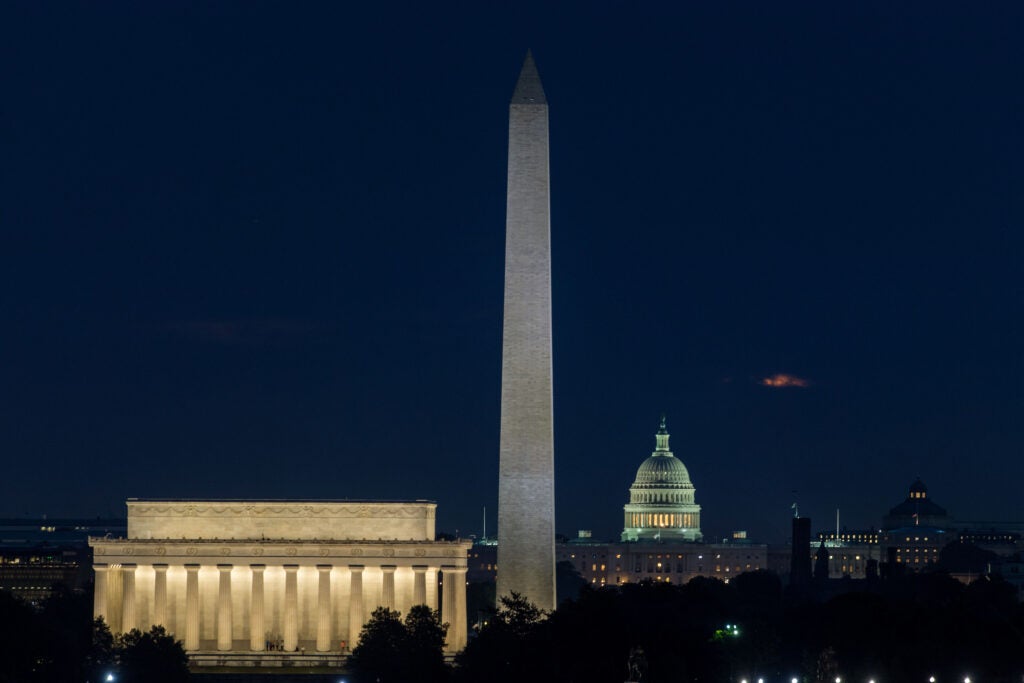 Washington DC at night featuring the Lincoln Memorial, The Washington Monument, and the Capital Building